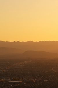 Preview wallpaper mountains, hills, town, sunrise
