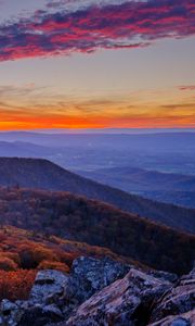 Preview wallpaper mountains, hills, trees, stones, sky, sunset
