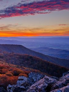 Preview wallpaper mountains, hills, trees, stones, sky, sunset