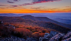 Preview wallpaper mountains, hills, trees, stones, sky, sunset