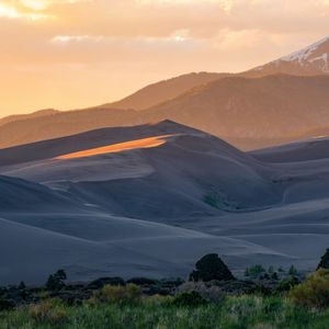 Preview wallpaper mountains, hills, trees, landscape, sunset