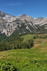 Preview wallpaper mountains, hills, trees, grass, landscape