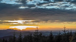 Preview wallpaper mountains, horizon, sunset, clouds, trees, sky