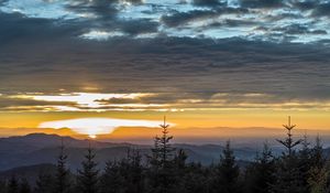 Preview wallpaper mountains, horizon, sunset, clouds, trees, sky