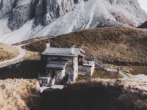 Preview wallpaper mountains, house, building, rocks, peak