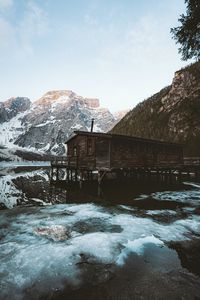 Preview wallpaper mountains, house, coast, lake, ice, landscape