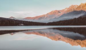 Preview wallpaper mountains, house, lake, reflection