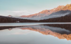 Preview wallpaper mountains, house, lake, reflection