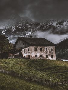 Preview wallpaper mountains, house, old, solitude, grass, fence, fog