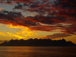 Preview wallpaper mountains, island, sunset, horizon, clouds, lofoten islands, norway