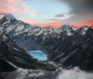 Preview wallpaper mountains, lake, aerial view, snowy, clouds, landscape