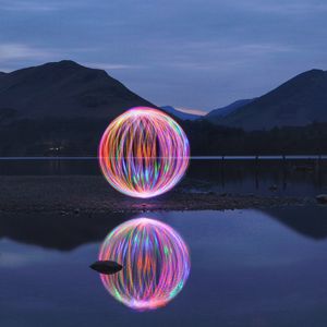 Preview wallpaper mountains, lake, ball, light, freezelight, long exposure