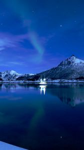 Preview wallpaper mountains, lake, boat, ice, sunset, starry sky