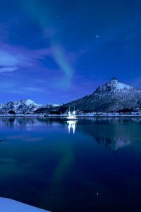 Preview wallpaper mountains, lake, boat, ice, sunset, starry sky