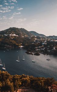 Preview wallpaper mountains, lake, boats, landscape, sky, aerial view