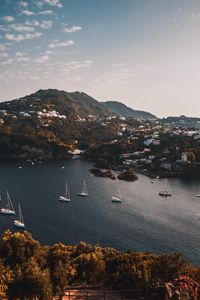 Preview wallpaper mountains, lake, boats, landscape, sky, aerial view