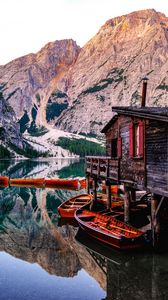 Preview wallpaper mountains, lake, boats, pier, building