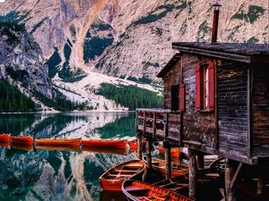 Preview wallpaper mountains, lake, boats, pier, building