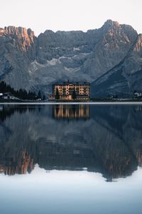 Preview wallpaper mountains, lake, building, architecture, reflection