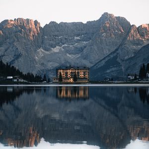 Preview wallpaper mountains, lake, building, architecture, reflection