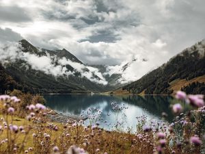 Preview wallpaper mountains, lake, clouds, wildflowers, sky