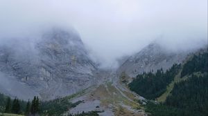 Preview wallpaper mountains, lake, fog, stones, trees