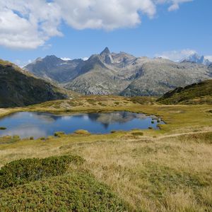 Preview wallpaper mountains, lake, glade, grass, landscape