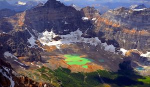 Preview wallpaper mountains, lake, green, water, thawing, tops, height, shadow, from above