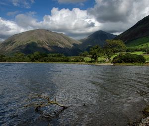 Preview wallpaper mountains, lake, greens, branch, sky, clouds