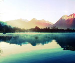 Preview wallpaper mountains, lake, haze, morning, cool, dawn, steam, boat