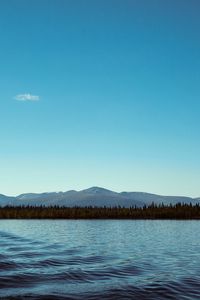 Preview wallpaper mountains, lake, horizon, trees, ripples