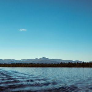 Preview wallpaper mountains, lake, horizon, trees, ripples