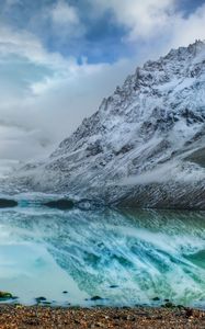 Preview wallpaper mountains, lake, ice, reflection, stones, coast, cold, freshness, clouds