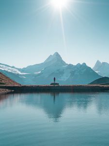 Preview wallpaper mountains, lake, man, silhouette, alone