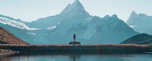 Preview wallpaper mountains, lake, man, silhouette, alone