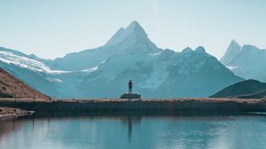 Preview wallpaper mountains, lake, man, silhouette, alone
