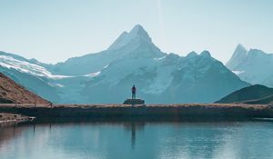 Preview wallpaper mountains, lake, man, silhouette, alone