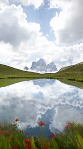 Preview wallpaper mountains, lake, man, grass, clouds