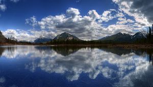 Preview wallpaper mountains, lake, panorama, surface, clouds, reflection