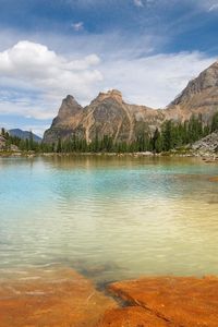 Preview wallpaper mountains, lake, plates, trees, stones