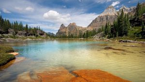 Preview wallpaper mountains, lake, plates, trees, stones