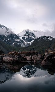 Preview wallpaper mountains, lake, reflection, rocks, clouds, snowy