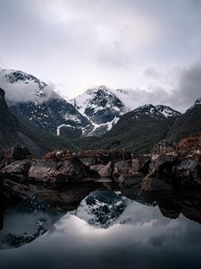 Preview wallpaper mountains, lake, reflection, rocks, clouds, snowy