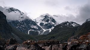 Preview wallpaper mountains, lake, reflection, rocks, clouds, snowy