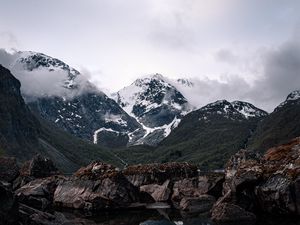 Preview wallpaper mountains, lake, reflection, rocks, clouds, snowy