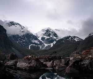 Preview wallpaper mountains, lake, reflection, rocks, clouds, snowy