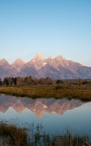 Preview wallpaper mountains, lake, reflection, grass