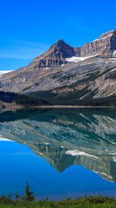 Preview wallpaper mountains, lake, reflection, snow, trees, landscape