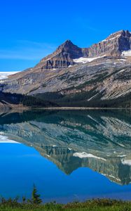 Preview wallpaper mountains, lake, reflection, snow, trees, landscape