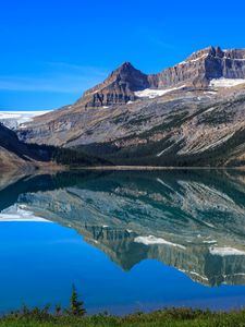 Preview wallpaper mountains, lake, reflection, snow, trees, landscape